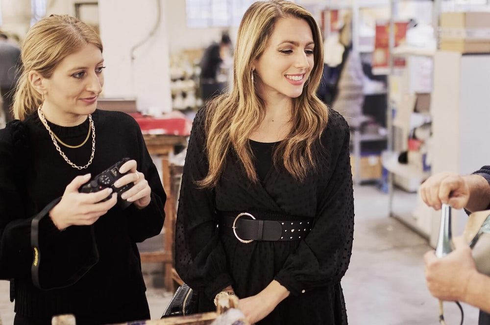 sisters standing next to each other in a retail setting